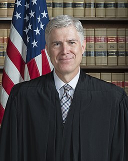 Justices Clarence Thomas, Samuel Alito and Neil Gorsuch (dissenting)